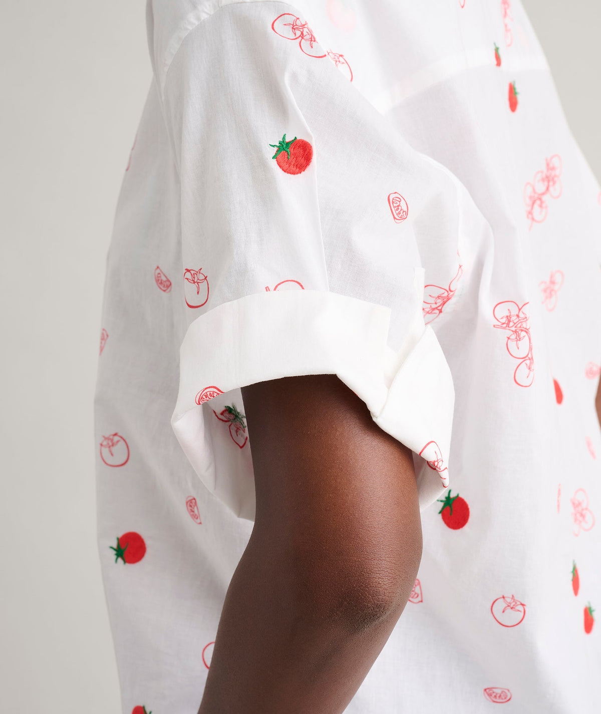 white embroidered tomato print shirt, detail view